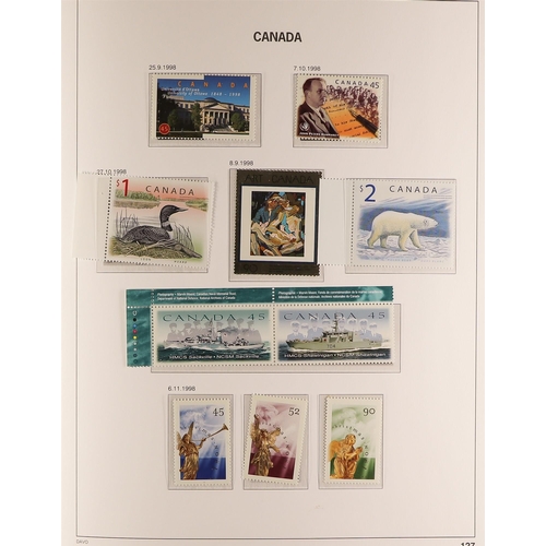 334 - CANADA 1990-2002 NEVER HINGED MINT COLLECTION in a DAVO hingeless printed album with slipcase, large... 