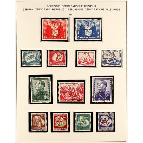 529 - GERMANY EAST 1949-90 USED COLLECTION IN THREE SCHAUBEK ALBUMS WITH SLIPCASES well filled incl. many ... 