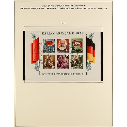 529 - GERMANY EAST 1949-90 USED COLLECTION IN THREE SCHAUBEK ALBUMS WITH SLIPCASES well filled incl. many ... 