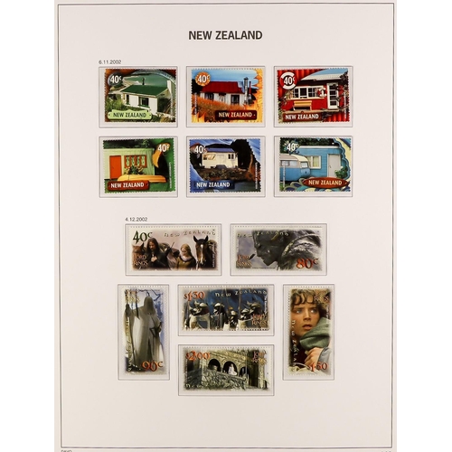 833 - NEW ZEALAND 1967-2016 COLLECTION IN FIVE S.G. LUXE HINGELESS ALBUMS WITH SLIP CASES with much comple... 