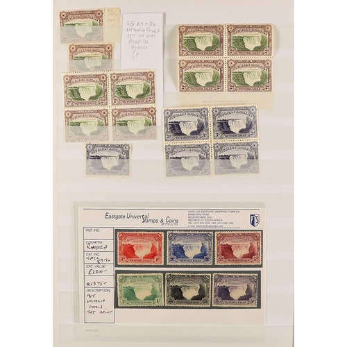 914 - RHODESIA THE RHODESIAS & ZIMBABWE 1892-2000's extensive mint & used ranges in 6 volumes, with MINT R... 