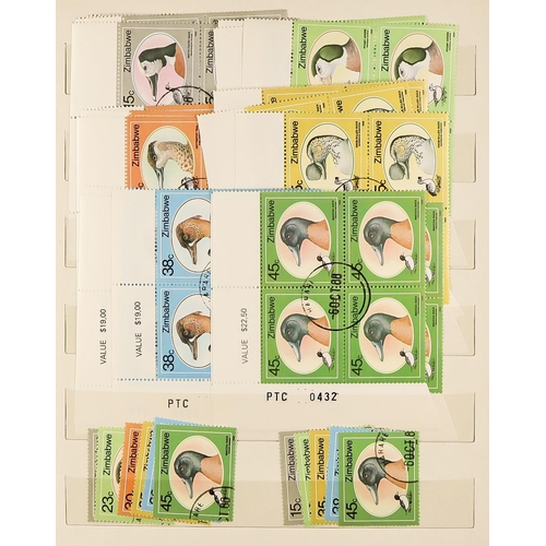 914 - RHODESIA THE RHODESIAS & ZIMBABWE 1892-2000's extensive mint & used ranges in 6 volumes, with MINT R... 