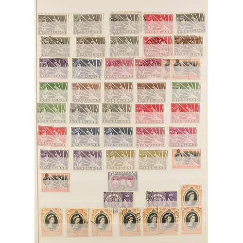 914 - RHODESIA THE RHODESIAS & ZIMBABWE 1892-2000's extensive mint & used ranges in 6 volumes, with MINT R... 