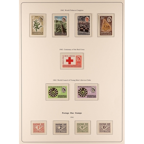 918 - RHODESIA & NYASA. 1954-63 NEVER HINGED MINT COLLECTION on printed album pages, complete basic issues... 