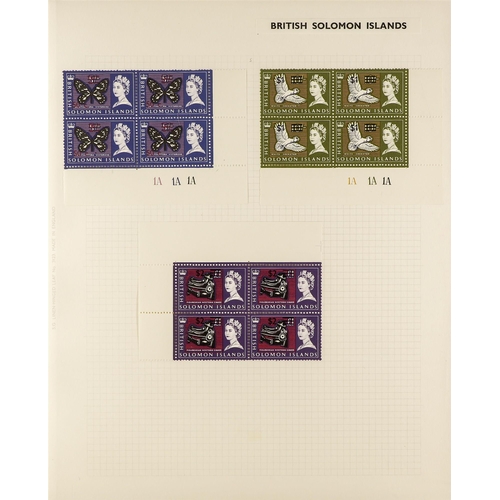 995 - SOLOMON IS. 1913-76 COLLECTION with many corner plate blocks of four in an album, QEII issues often ... 