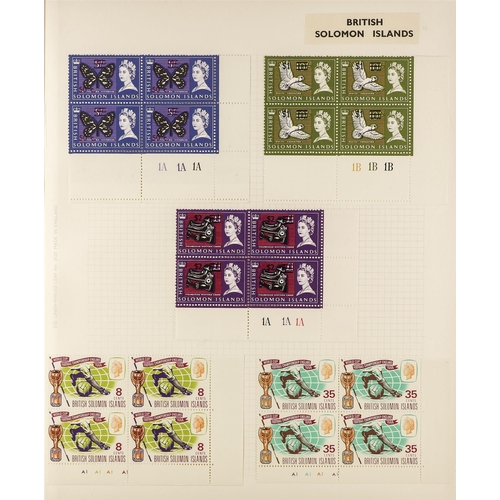 995 - SOLOMON IS. 1913-76 COLLECTION with many corner plate blocks of four in an album, QEII issues often ... 