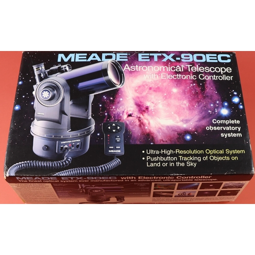 24 - ASTRONOMICAL TELESCOPE - MEADE ETX 90EC with deluxe filed tripod (884), a second tripod, and other a... 