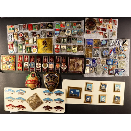 73 - RUSSIAN BADGES AND EPHEMERA. A collection of approximately 130 badges from the 1960s-1990s with many... 