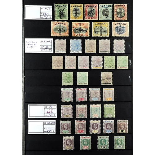 90 - COMMONWEALTH BETTER ITEMS. Two stock books containing sets, higher / top values, stamps with varieti... 