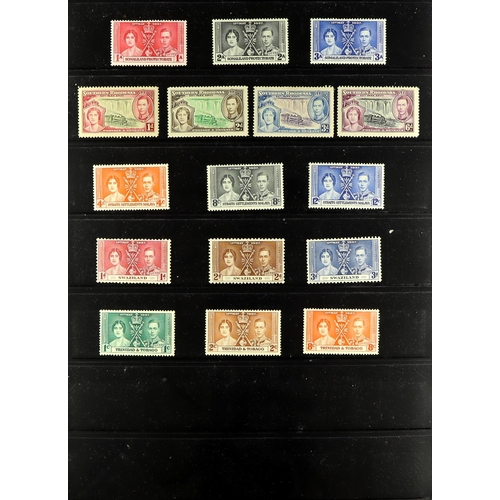 254 - 1937 CORONATION OMNIBUS mint sets, two runs from Aden to Turks & Caicos, one more complete than the ... 