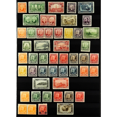 409 - CANADA 1875 - 1952 MINT / NEVER HINGED STAMPS ASSEMBLY on stock book pages incl sets, coil stamps, b... 