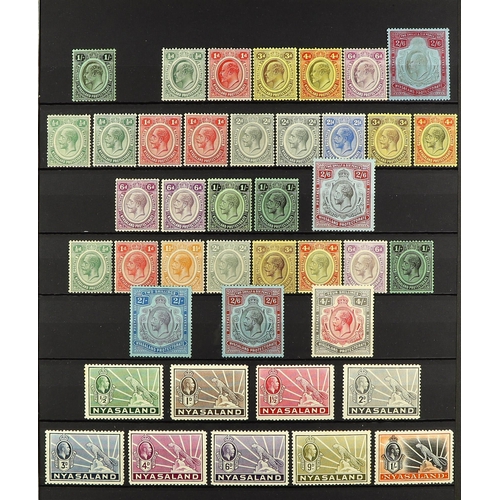 903 - NYASALAND 1908 - 1935 MINT COLLECTION on black protective page, note 1908-11 vals to 2s6d, 1913-21 v... 