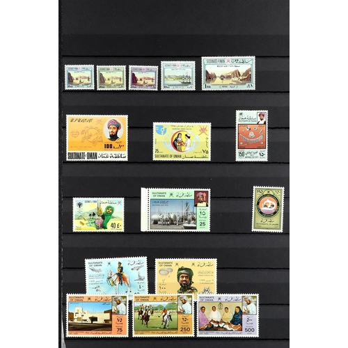 904 - OMAN 1972 - 2013 NEVER HINGED MINT COLLECTION on black stock pages, many sets (approx 150 stamps, 2 ... 