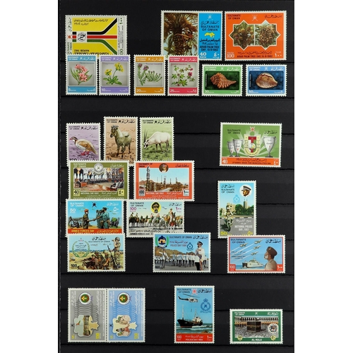 904 - OMAN 1972 - 2013 NEVER HINGED MINT COLLECTION on black stock pages, many sets (approx 150 stamps, 2 ... 