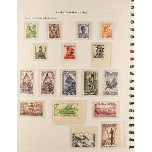 914 - PAPUA NEW GUINEA 1952 - 1989 NEVER HINGED MINT COLLECTION near-complete, in multi-ring album, all se... 