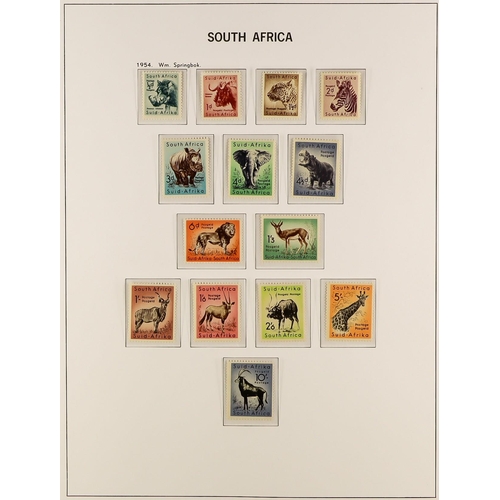 1008 - SOUTH AFRICA 1910 - 1961 NEVER HINGED MINT COLLECTION in a Davo hingeless stamp album with just two ... 