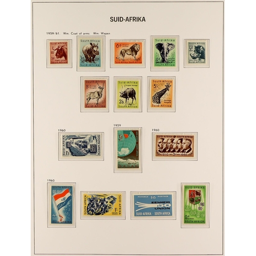 1008 - SOUTH AFRICA 1910 - 1961 NEVER HINGED MINT COLLECTION in a Davo hingeless stamp album with just two ... 