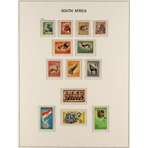 1008 - SOUTH AFRICA 1910 - 1961 NEVER HINGED MINT COLLECTION in a Davo hingeless stamp album with just two ... 