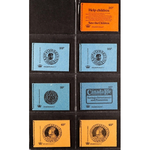 1428 - GB.ELIZABETH II 1970s BOOKLETS in two albums. Face /swap-out value £48.
Lot 1428 
[b]