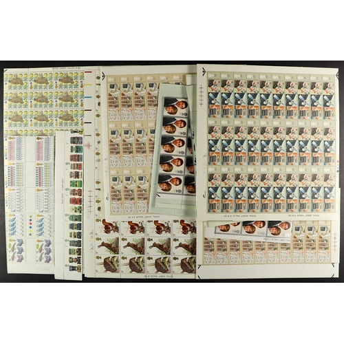 1507 - GB.ELIZABETH II SELECTION BOX OF MINT STAMPS. Includes sheets, part sheets, year packs, a year book ... 