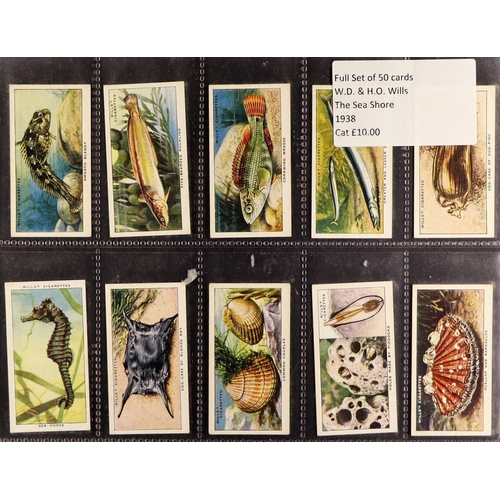 14 - CIGARETTE / TRADE CARDS -  COMPLETE SETS in album. Includes Carreras 'Figures of Fiction, Ogden's 'A... 