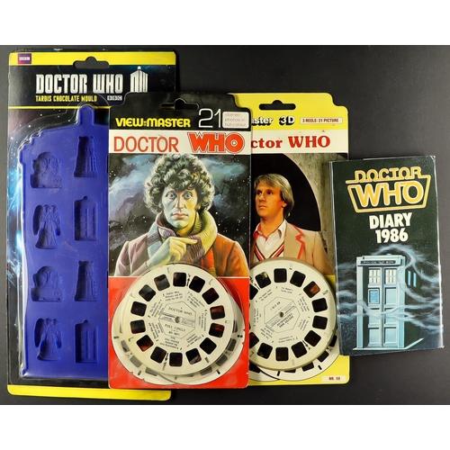 66 - DR WHO - COLLECTABLE SELECTION INCLUDING SIGNED. 2 t-shirts, 2 neck ties, baking mould, bookmark, er... 