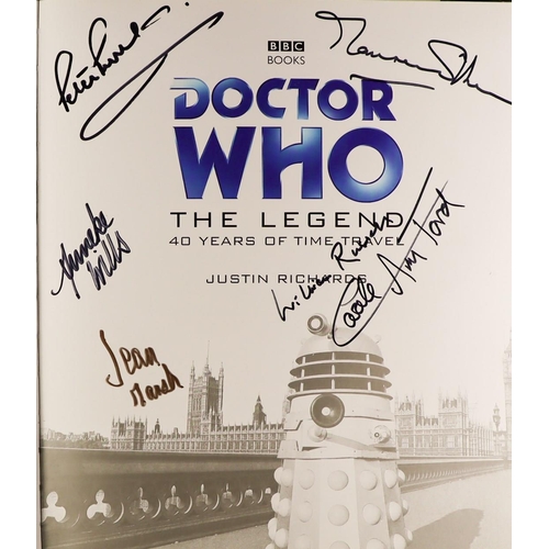 97 - DR WHO - THE LEGEND SIGNED BOOK. Many autographs with include Tom Baker, Peter Davidson, Sophie Aldr... 