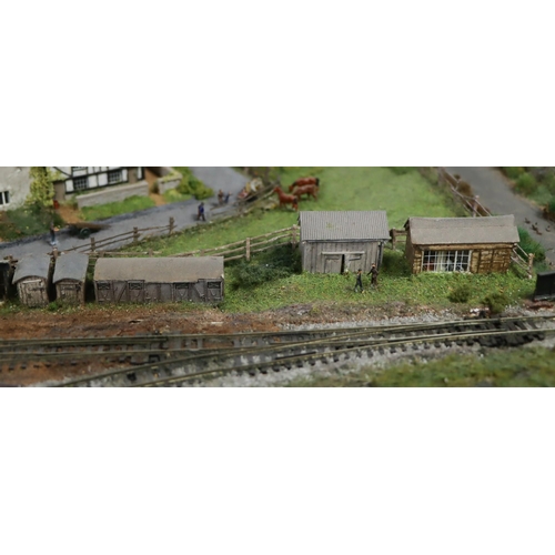 167 - N GAUGE TRACK LAYOUT - TENTERTON TOWN. Set in the 1940s with railway yard, village shop, cottages, a... 