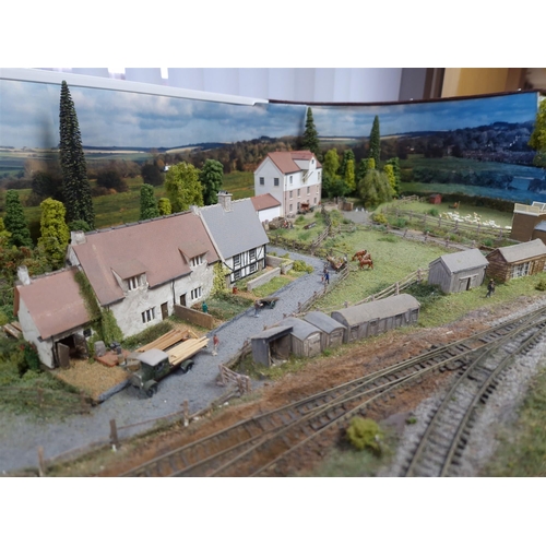 167 - N GAUGE TRACK LAYOUT - TENTERTON TOWN. Set in the 1940s with railway yard, village shop, cottages, a... 