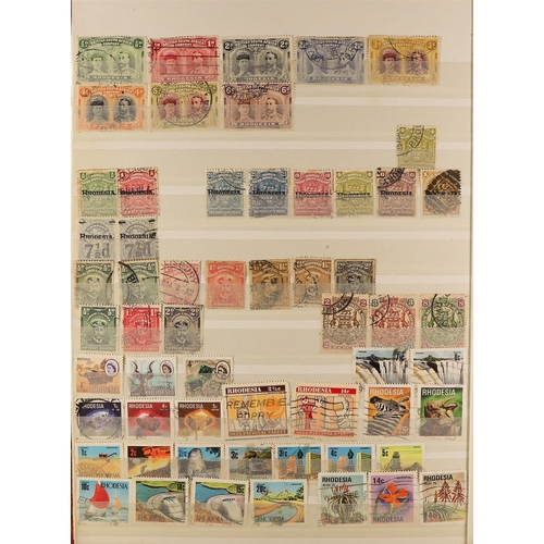 244 - COMMONWEALTH IN 5 STOCKBOOKS. A somewhat untidy mint & used collection of QV to QEII stamps incl Cap... 