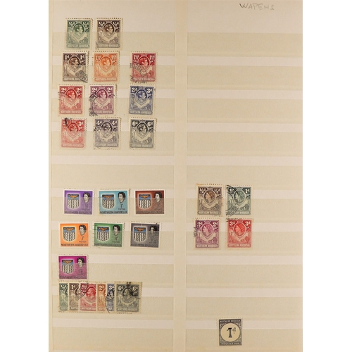 244 - COMMONWEALTH IN 5 STOCKBOOKS. A somewhat untidy mint & used collection of QV to QEII stamps incl Cap... 