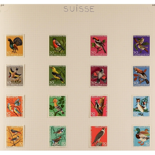 297 - ANIMALS ON STAMPS. A collection of chiefly mint stamps & sets in album, of birds, animals, sea life,... 