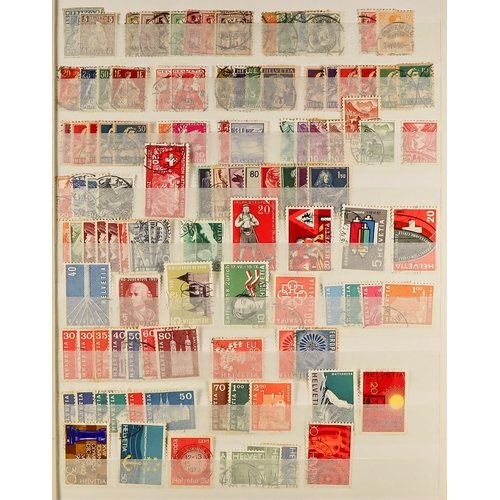 325 - WORLD COLLECTION Mostly 20th Century mainly used stamps in eighteen stockbooks, includes British Com... 