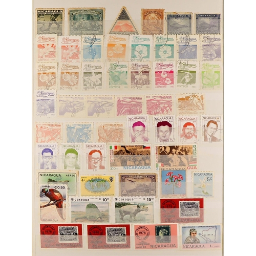 325 - WORLD COLLECTION Mostly 20th Century mainly used stamps in eighteen stockbooks, includes British Com... 