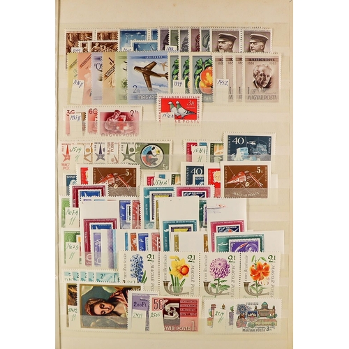 105 - WORLD WIDE MINT / NEVER HINGED MINT STAMPS in stock books, packets, glassine envelopes, on stock car... 