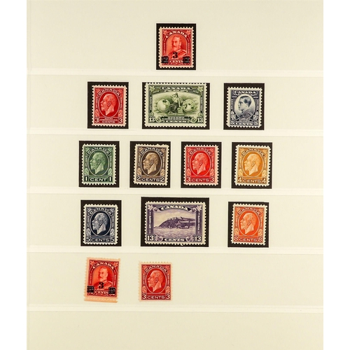 409 - CANADA 1911 - 1936 MINT / NEVER HINGED MINT COLLECTION of around 150 stamps on hingeless pages, stro... 