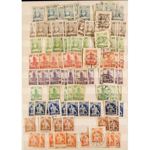 497 - FIUME 1918 - 1924 ACCUMULATION of around 1500 mint & used stamps in stockbook, various overprints on... 