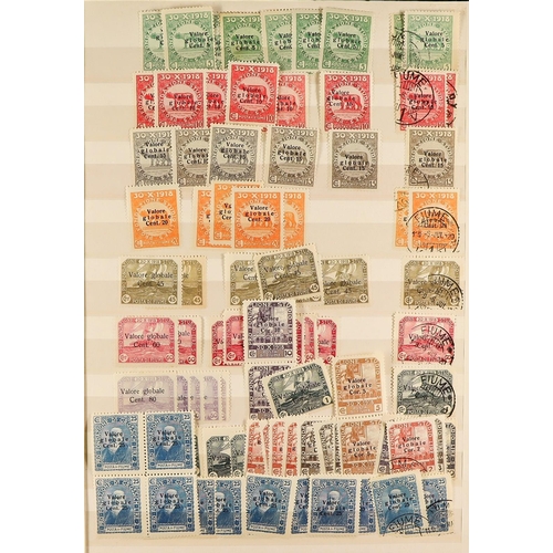 497 - FIUME 1918 - 1924 ACCUMULATION of around 1500 mint & used stamps in stockbook, various overprints on... 