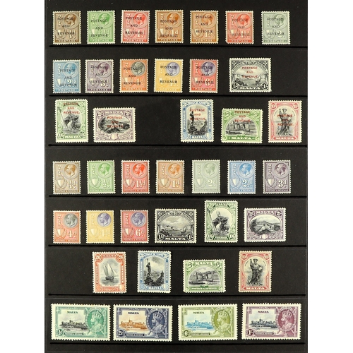 823 - MALTA 1925 - 1935 MINT COLLECTION of 73 stamps on protective pages, only 1 stamp missing for the per... 