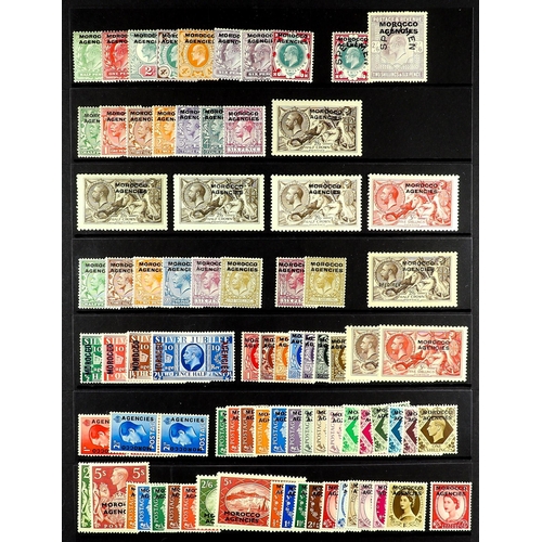 847 - MOROCCO AGENCIES BRITISH CURRENCY 1907 - 1956 collecton of 80+ mint stamps on a protective page, inc... 