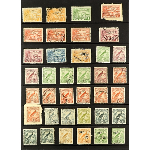 942 - NEW GUINEA 1915 - 1939 SPECIALISED ASSORTMENT of 100+ used stamps on various pages collected for sta... 