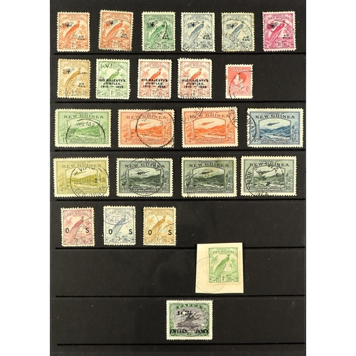 942 - NEW GUINEA 1915 - 1939 SPECIALISED ASSORTMENT of 100+ used stamps on various pages collected for sta... 