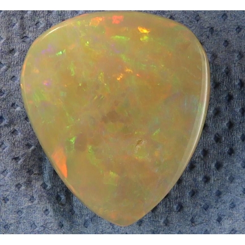 130 - GEMSTONE 28ct ETHIOPIAN OPAL. Pear shape with an opaque white dominance and splashes filling the bod... 