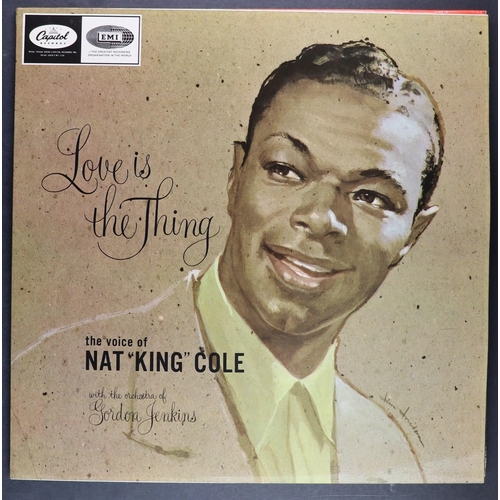 215 - VINYL RECORDS - NAT KING COLE AND LOUIS ARMSTRONG. A selection of 33 rpm albums. Louis Armstrong inc... 