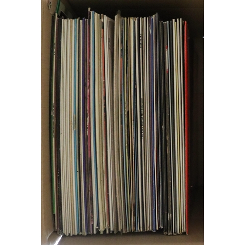 215 - VINYL RECORDS - NAT KING COLE AND LOUIS ARMSTRONG. A selection of 33 rpm albums. Louis Armstrong inc... 