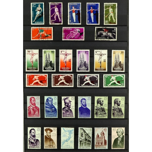 1249 - SPAIN 1939 - 1980 COLLECTION in album of mint & used in 2 stock books, loads of sets (often mint + u... 