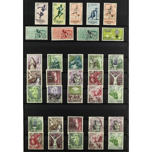 1249 - SPAIN 1939 - 1980 COLLECTION in album of mint & used in 2 stock books, loads of sets (often mint + u... 