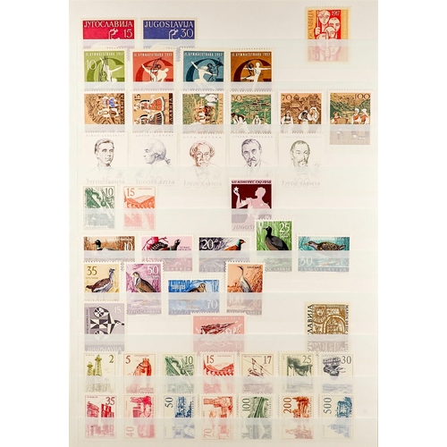 1342 - YUGOSLAVIA 1950 - 1959 COMPLETE COLLECTION of never hinged mint stamps on protective pages. Michel c... 