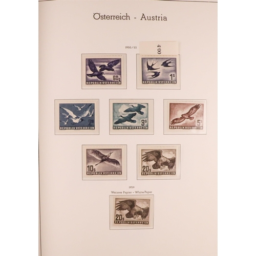 255 - AUSTRIA 1945-2012 COMPREHENSIVE NEVER HINGED MINT COLLECTION in three hingeless albums, seems to be ... 