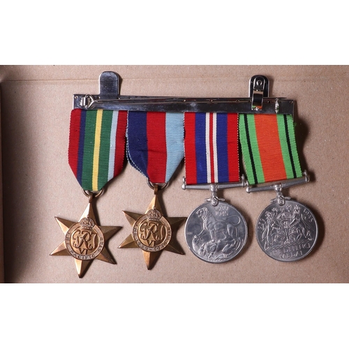 28 - WORLD WAR II MEDALS. Comprising of War Medal, Defence Medal, Star and Pacific Star. The medals belon... 